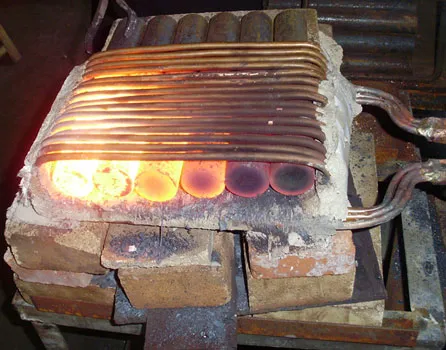 乌克兰客户采用40kw超音频加热炉对圆钢进行透热热处理